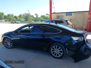 2013 Toyota Avalon XLE with VIN 4T1BK1EB6DU038913, listed as a IAAI auction lot 42030660 with 151,691 mi miles and . Bid and sale history available at DreamBid. Image 14.