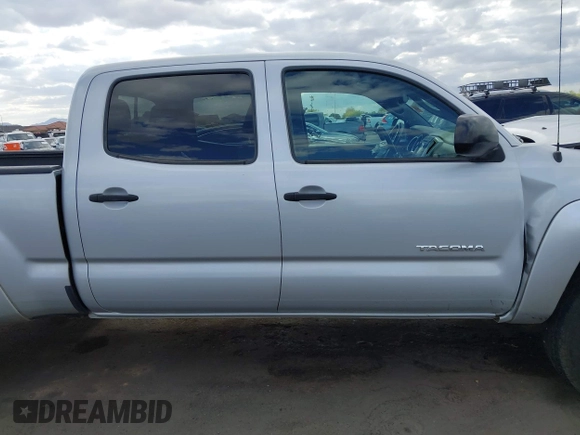 2012 Toyota Tacoma with VIN 3TMMU4FN5CM047333, listed as a IAAI auction lot 42082248 with 192,467 mi miles and . Bid and sale history available at DreamBid. Image 13.
