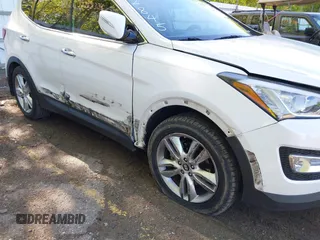 2013 Hyundai Santa Fe Sport z VIN 5XYZU3LA2DG122845, wystawiony jako IAAI lot #39368336 z przebiegiem 101 257 mil mil oraz . Historia ofert i sprzedaży dostępna na DreamBid. Obrazek 6.