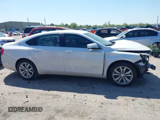 2018 Chevrolet Impala LT with VIN 1G1105S34JU106107, listed as a IAAI auction lot 41871693 with 111,412 mi miles and . Bid and sale history available at DreamBid. Image 13.