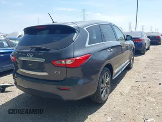 2013 Infiniti JX35 with VIN 5N1AL0MM1DC306701, listed as a IAAI auction lot 42131992 with 177,357 mi miles. Bid and sale history available at carsss.com. Image 4.