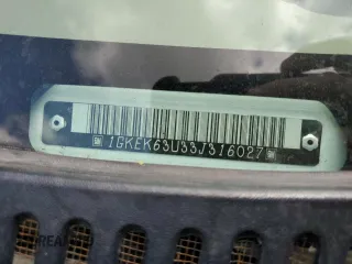 2003 GMC Yukon Denali z VIN 1GKEK63U33J316027, wystawiony jako Copart lot #56869815 z przebiegiem 200 916 mil mil oraz Szkoda całkowita • Salvage title. Historia ofert i sprzedaży dostępna na DreamBid. Obrazek 13.