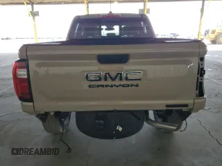 2023 GMC Canyon 2WD Elevation with VIN 1GTP5BEK7P1248837, listed as a Copart auction lot 77825924 with 6,793 mi miles and Salvage Title. Bid and sale history available at carsss.com. Image 6.