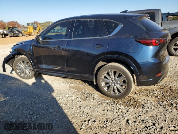 2023 Mazda CX-5 Signature with VIN JM3KFBXY1P0122544, listed as a Copart auction lot 83712034 with 27,032 mi miles and Salvage Title. Bid and sale history available at DreamBid. Image 2.