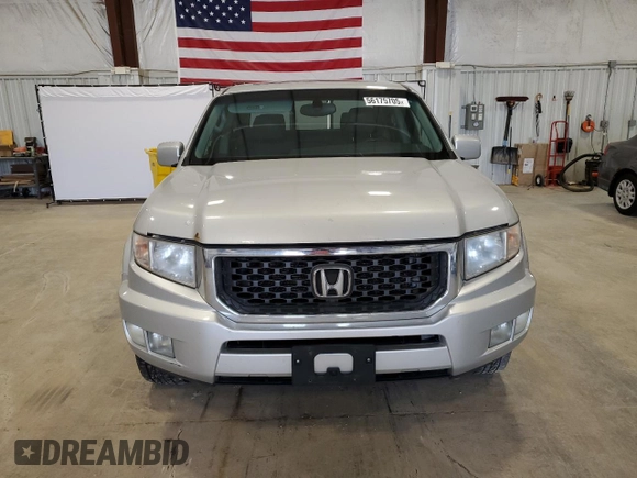 2009 Honda Ridgeline RTL with VIN 5FPYK16569B101779, listed as a Copart auction lot 56175705 with 275,282 mi miles and Clean Title. Bid and sale history available at DreamBid. Image 5.