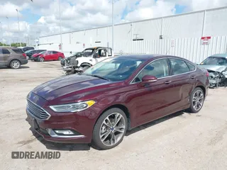 2017 Ford Fusion Titanium with VIN 3FA6P0K97HR214485, listed as a IAAI auction lot 40208619 with 39,265 mi miles and . Bid and sale history available at DreamBid. Image 18.
