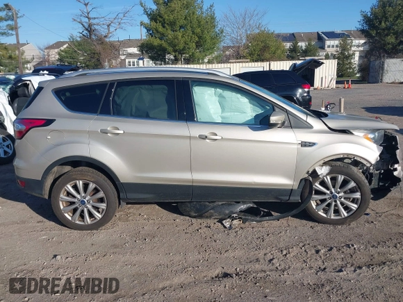 2017 Ford Escape Titanium with VIN 1FMCU0JD2HUD92675, listed as a IAAI auction lot 41834723 with 113,503 mi miles. Bid and sale history available at carsss.com. Image 13.