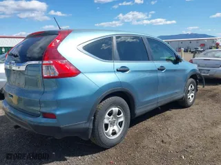 2015 Honda CR-V LX with VIN 5J6RM3H39FL001273, listed as a IAAI auction lot 42054577 with 75,084 mi miles. Bid and sale history available at carsss.com. Image 4.