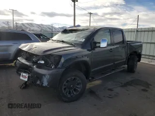 2013 Nissan Titan PRO-4X with VIN 1N6BA0EC2DN305708, listed as a Copart auction lot 45329275 with 68,636 mi miles and Salvage Title. Bid and sale history available at carsss.com. Image 1.