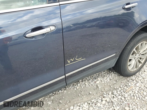 2019 Cadillac XT5 Luxury FWD with VIN 1GYKNCRSXKZ101832, listed as a Copart auction lot 54574825 with Not provided miles and Salvage title. Bid and sale history available at DreamBid. Image 13.