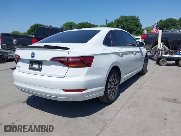 2019 Volkswagen Jetta S z VIN 3VWCB7BU9KM144272, wystawiony jako IAAI lot #41997518 z przebiegiem 91 950 mil mil oraz . Historia ofert i sprzedaży dostępna na DreamBid. Obrazek 4.