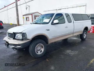 1997 Ford F-150 XL with VIN 1FTEX18L6VKC06859, listed as a IAAI auction lot 41592418 with 274,814 mi miles. Bid and sale history available at carsss.com. Image 18.