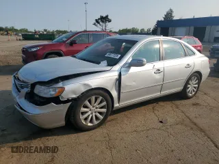 2010 Hyundai Azera Limited z VIN KMHFC4DF9AA512421, wystawiony jako Copart lot #59077225 z przebiegiem 149 892 mil mil oraz Czysty tytuł • Clean title. Historia ofert i sprzedaży dostępna na DreamBid. Obrazek 1.