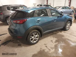 2018 Mazda CX-3 Sport with VIN JM1DKFB70J0321370, listed as a IAAI auction lot 41635558 with 53,995 mi miles. Bid and sale history available at carsss.com. Image 4.