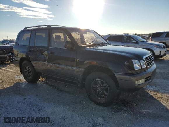 2000 Lexus LX 470 z VIN JT6HT00W3Y0090164, wystawiony jako Copart lot #41338515 z przebiegiem 209 338 mil mil oraz Szkoda całkowita • Salvage title. Historia ofert i sprzedaży dostępna na DreamBid. Obrazek 4.