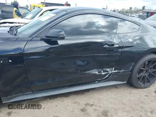 2020 Ford Mustang EcoBoost with VIN 1FA6P8THXL5177271, listed as a IAAI auction lot 41816058 with 87,226 mi miles and . Bid and sale history available at DreamBid. Image 6.