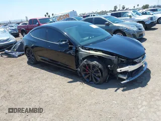 2020 Tesla Model 3 Performance z VIN 5YJ3E1EC5LF641593, wystawiony jako IAAI lot #42153291 z przebiegiem 70 264 mil mil oraz . Historia ofert i sprzedaży dostępna na DreamBid. Obrazek 1.