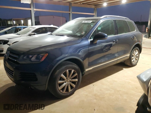 2012 Volkswagen Touareg Exec with VIN WVGEF9BP8CD007760, listed as a Copart auction lot 79271654 with 164,287 mi miles and Clean Title. Bid and sale history available at DreamBid. Image 1.