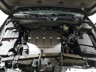 2010 Cadillac DTS 1SC z VIN 1G6KD5EY7AU128077, wystawiony jako Copart lot #58089475 z przebiegiem 203 830 mil mil oraz Szkody całkowita. Historia ofert i sprzedaży dostępna na DreamBid. Obrazek 11.