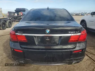 2015 BMW 7 Series 750Li xDrive z VIN WBAYF8C56FD654233, wystawiony jako Copart lot #83321604 z przebiegiem Nie podano mil oraz Nie do naprawy • Non repairable. Historia ofert i sprzedaży dostępna na DreamBid. Obrazek 6.