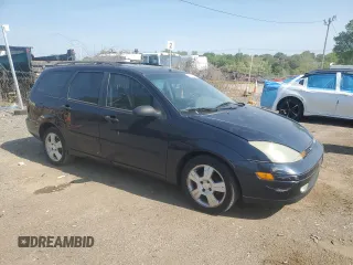 2003 Ford Focus with VIN 1FAHP36Z43W316899, listed as a Copart auction lot 55343955 with 178,646 mi miles and Salvage title. Bid and sale history available at DreamBid. Image 4.