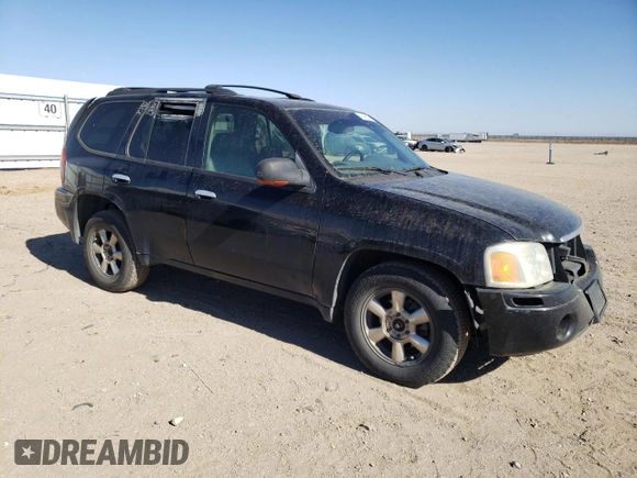 2002 GMC Envoy SLT with VIN 1GKDT13S022107749, listed as a Copart auction lot 59548544 with 221,224 mi miles and Clean Title. Bid and sale history available at DreamBid. Image 4.