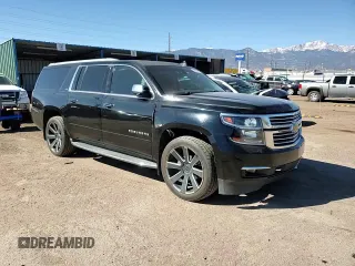 2015 Chevrolet Suburban LTZ with VIN 1GNSKKKC2FR634654, listed as a Copart auction lot 50337415 with 150,255 mi miles and Salvage Title. Bid and sale history available at DreamBid. Image 11.