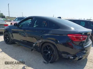 2018 BMW X6 xDrive50i with VIN 5UXKU6C58J0W39038, listed as a IAAI auction lot 40025654 with 106,080 mi miles. Bid and sale history available at carsss.com. Image 14.