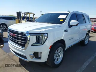 2021 GMC Yukon SLT z VIN 1GKS1BKD8MR250738, wystawiony jako IAAI lot #41996570 z przebiegiem 85 905 mil mil oraz . Historia ofert i sprzedaży dostępna na DreamBid. Obrazek 2.