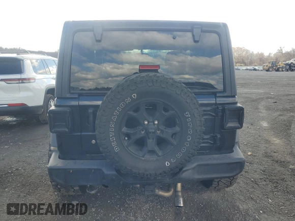 2020 Jeep Wrangler Willys с VIN 1C4GJXAN3LW245519, выставлен на аукционе Copart как лот 80423904 с пробегом 64 266 миль миль и Списание • Salvage title. История ставок и продаж доступна на DreamBid. Изображение 6.