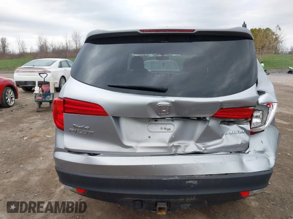 2017 Honda Pilot EX-L with VIN 5FNYF6H5XHB014067, listed as a IAAI auction lot 42083742 with 143,043 mi miles and . Bid and sale history available at DreamBid. Image 6.