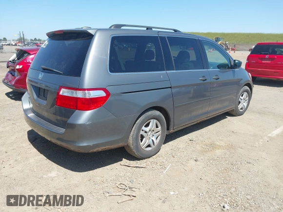 2007 Honda Odyssey EX-L z VIN 5FNRL38797B137595, wystawiony jako IAAI lot #42002233 z przebiegiem 192 296 mil mil oraz . Historia ofert i sprzedaży dostępna na DreamBid. Obrazek 4.