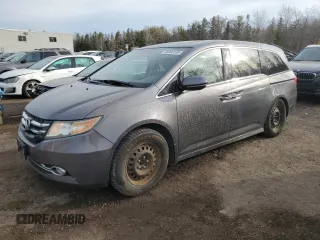 2014 Honda Odyssey Touring with VIN 5FNRL5H94EB503957, listed as a Copart auction lot 48983595 with 227,680 mi miles and Salvage Title. Bid and sale history available at carsss.com. Image 1.