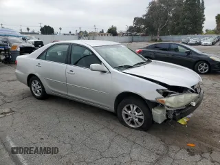 2005 Toyota Camry LE with VIN 4T1BF32KX5U601192, listed as a Copart auction lot 55365485 with 153,251 mi miles and Salvage Title. Bid and sale history available at DreamBid. Image 4.