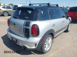 2014 MINI Countryman S with VIN WMWZC5C52EWP36667, listed as a IAAI auction lot 42541120 with 149,331 mi miles and . Bid and sale history available at DreamBid. Image 4.