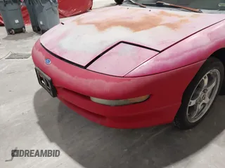 1997 Ford Probe z VIN 1ZVLT20A3V5146926, wystawiony jako IAAI lot #41852687 z przebiegiem 174 450 mil mil oraz . Historia ofert i sprzedaży dostępna na DreamBid. Obrazek 6.