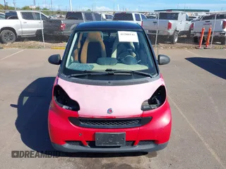 2009 Smart fortwo Pure z VIN WMEEJ31XX9K219695, wystawiony jako IAAI lot #41280141 z przebiegiem 93 896 mil mil oraz . Historia ofert i sprzedaży dostępna na DreamBid. Obrazek 6.
