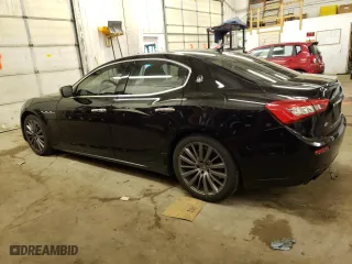 2016 Maserati Ghibli S Q4 with VIN ZAM57RTA3G1171304, listed as a Copart auction lot 69976983 with 97,099 mi miles. Bid and sale history available at carsss.com. Image 2.