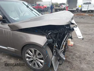 2015 Land Rover Range Rover HSE z VIN SALGS2VF4FA220237, wystawiony jako IAAI lot #41087301 z przebiegiem 110 309 mil mil oraz . Historia ofert i sprzedaży dostępna na DreamBid. Obrazek 18.