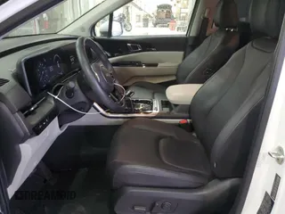 2023 Kia Carnival SX with VIN KNDNE5H37P6231312, listed as a Copart auction lot 44329745 with 55,492 mi miles and Salvage Title. Bid and sale history available at carsss.com. Image 7.