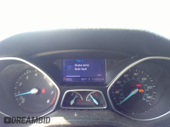 2013 Ford Focus SE with VIN 1FADP3F28DL215983, listed as a IAAI auction lot 42659890 with 117,912 mi miles and . Bid and sale history available at DreamBid. Image 7.