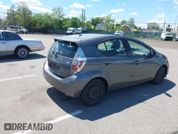 2013 Toyota Prius One with VIN JTDKDTB39D1546463, listed as a IAAI auction lot 42204559 with 142,006 mi miles. Bid and sale history available at carsss.com. Image 4.
