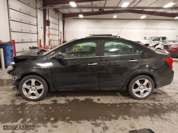 2015 Chevrolet Sonic LTZ with VIN 1G1JE5SB3F4109869, listed as a IAAI auction lot 41412964 with NaN miles. Bid and sale history available at carsss.com. Image 15.