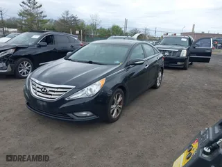 2013 Hyundai Sonata SE with VIN 5NPEC4ACXDH696923, listed as a IAAI auction lot 42088099 with 205,068 mi miles. Bid and sale history available at carsss.com. Image 2.
