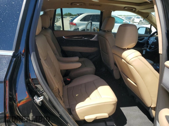 2024 Cadillac XT6 Premium Luxury z VIN 1GYKPERS1RZ755490, wystawiony jako Copart lot #49706575 z przebiegiem 4 239 mil mil oraz Szkoda całkowita • Salvage title. Historia ofert i sprzedaży dostępna na DreamBid. Obrazek 11.