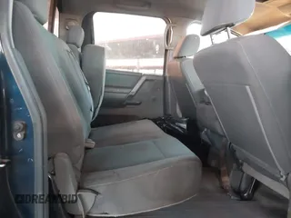 2006 Nissan Titan SE z VIN 1N6AA07AX6N509540, wystawiony jako IAAI lot #42054973 z przebiegiem 166 413 mil mil oraz . Historia ofert i sprzedaży dostępna na DreamBid. Obrazek 8.
