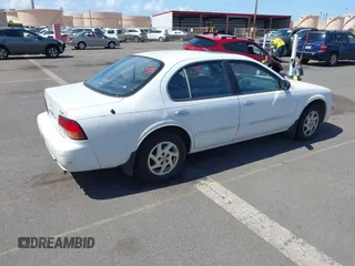 1998 Nissan Maxima GXE z VIN JN1CA21D6WT510015, wystawiony jako IAAI lot #42004731 z przebiegiem 114 575 mil mil oraz . Historia ofert i sprzedaży dostępna na DreamBid. Obrazek 4.