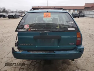 1994 Ford Escort z VIN 1FARP15J1RW125762, wystawiony jako Copart lot #85853184 z przebiegiem 75 229 mil mil oraz Szkoda całkowita • Salvage title. Historia ofert i sprzedaży dostępna na DreamBid. Obrazek 6.