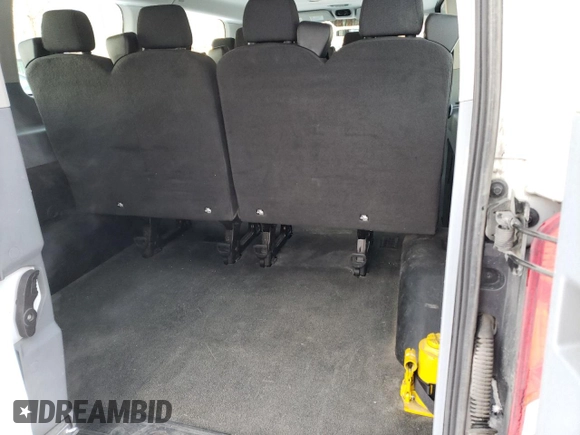 2016 Ford Transit XL z VIN 1FBZX2YM6GKB14495, wystawiony jako Copart lot #81963914 z przebiegiem 94 313 mil mil oraz Szkoda całkowita • Salvage title. Historia ofert i sprzedaży dostępna na DreamBid. Obrazek 10.
