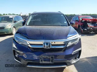 2020 Honda Pilot Elite with VIN 5FNYF6H02LB054348, listed as a IAAI auction lot 42302525 with 43,916 mi miles and . Bid and sale history available at DreamBid. Image 12.